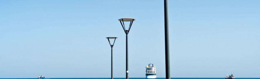 Empty,Wooden,Sea,Pier,With,Three,Street,Lamps,In,Front